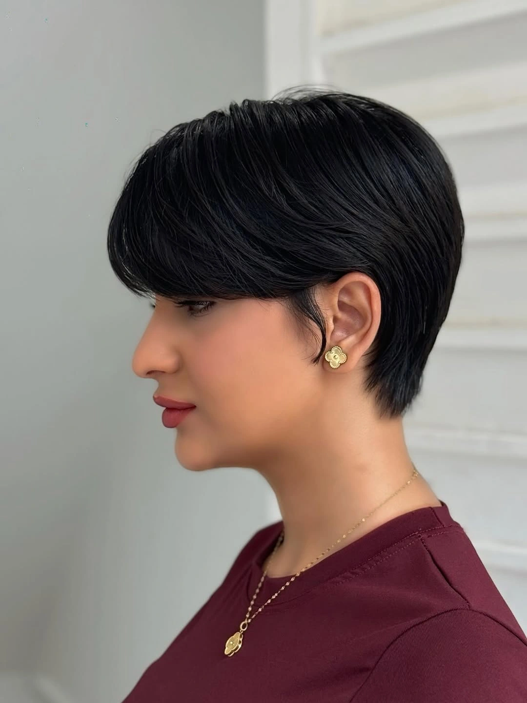 Fall hairstyles for short hair 2026 Glossy Espresso Pixie With Feathered Layers