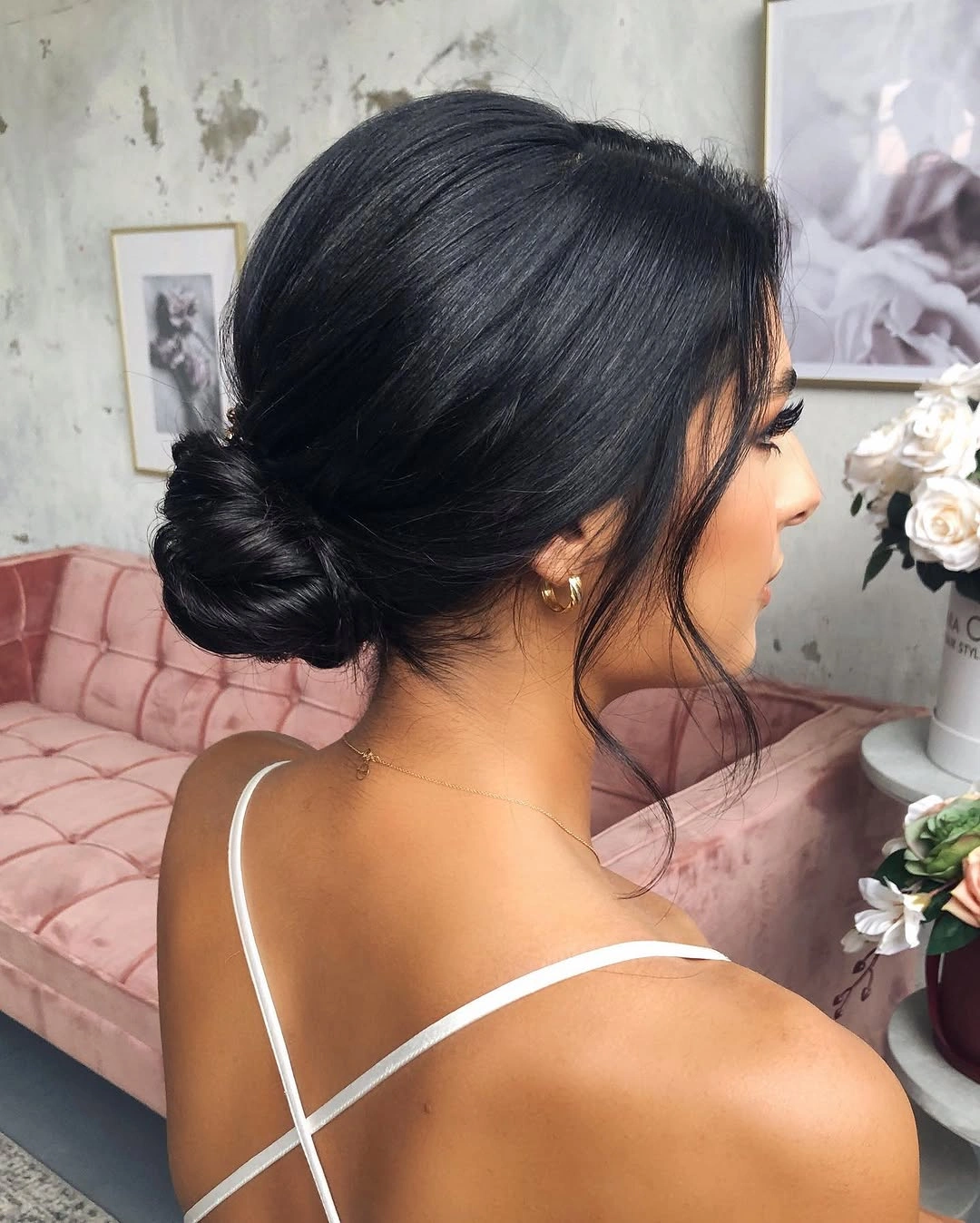 Fall hairstyles for wedding guests 2026 Elegant Low Chignon with Timeless Sophistication