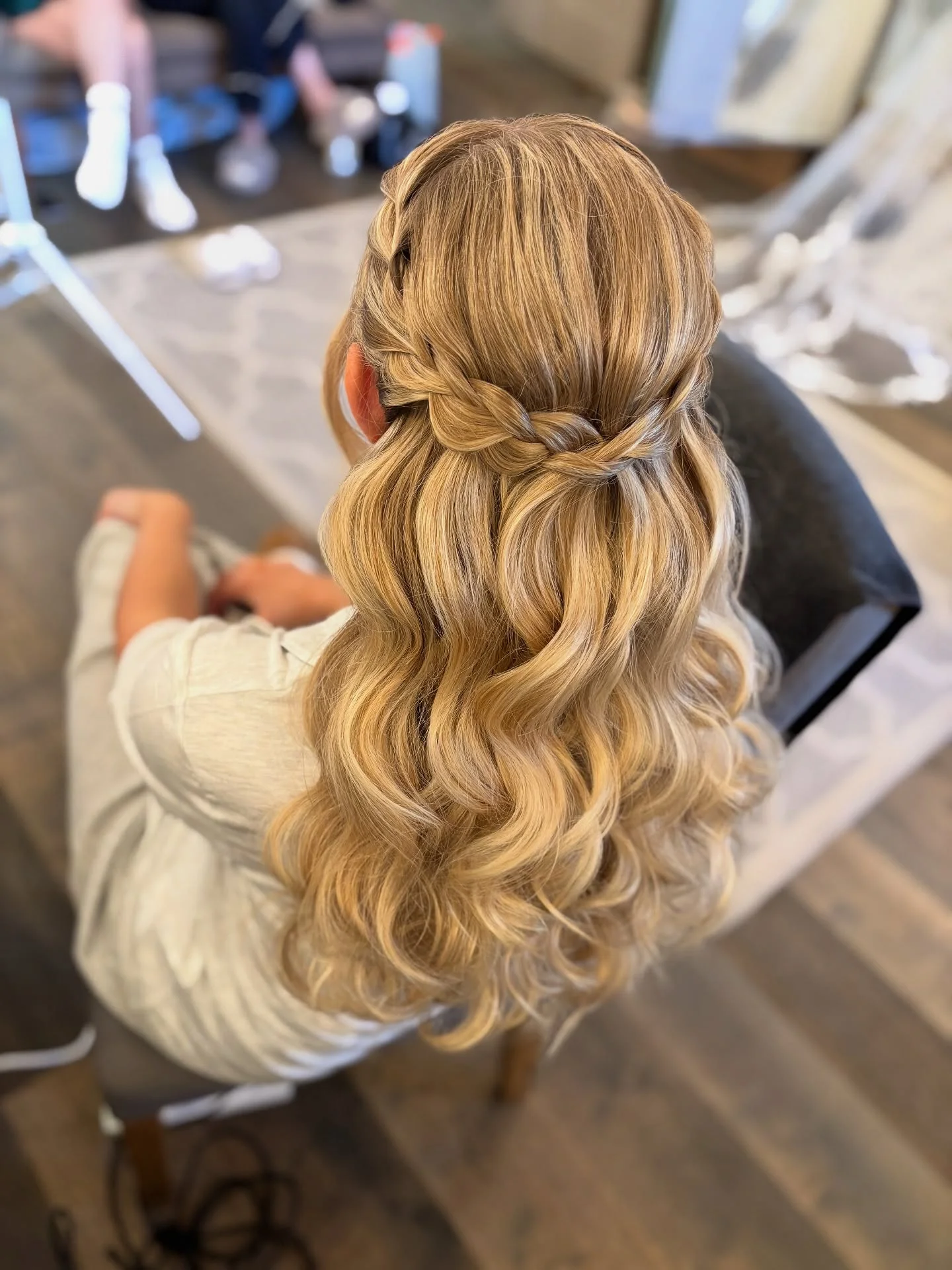 Fall hairstyles for wedding guests 2026 Golden Twisted Half-Up Waves Full of Autumn Charm