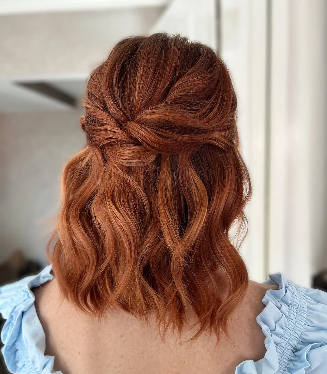 Fall hairstyles for wedding guests 2026 Soft Copper Half-Up Style for Shoulder-Length Hair