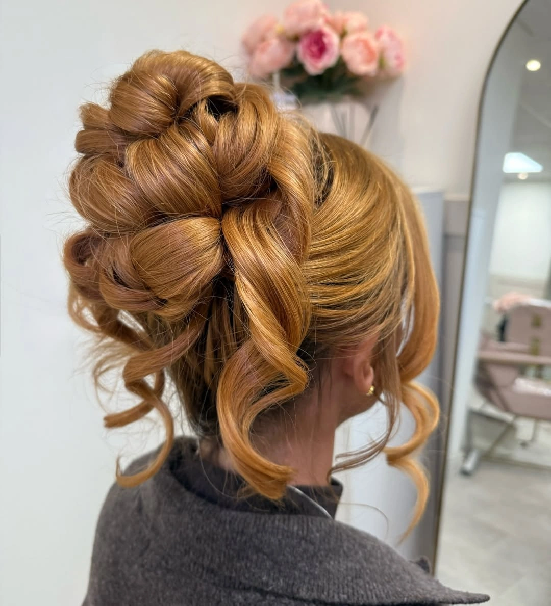 Fall hairstyles for wedding guests 2026 Elegant Golden Blonde Twisted Bun with Soft Curls