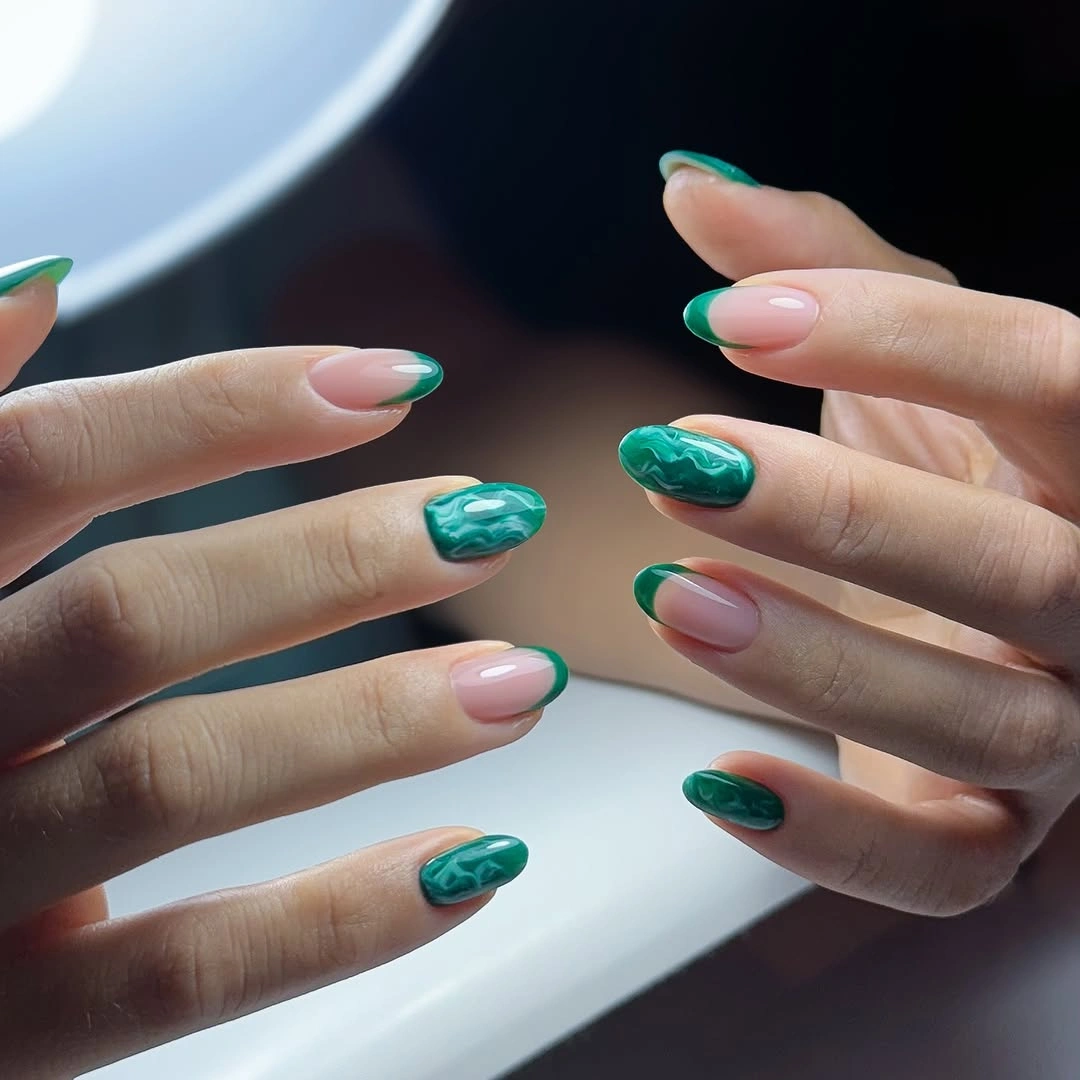 Fall manicure 2026 Green Marble Accent Manicure With Nude Bases