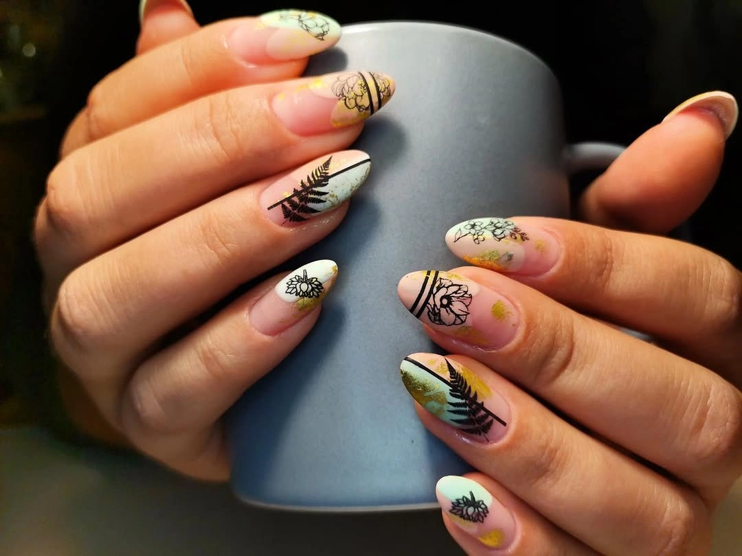 Fall manicure 2026 Botanical Leaf Manicure With Graphic Lines