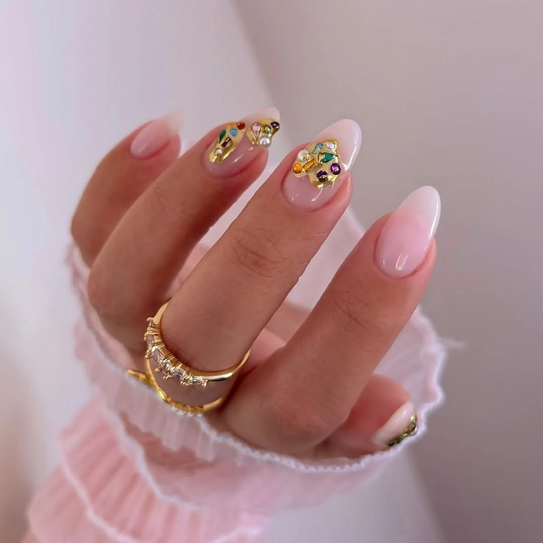 Fall manicure 2026 Pink Almond Nails With Tiny Floral Accents