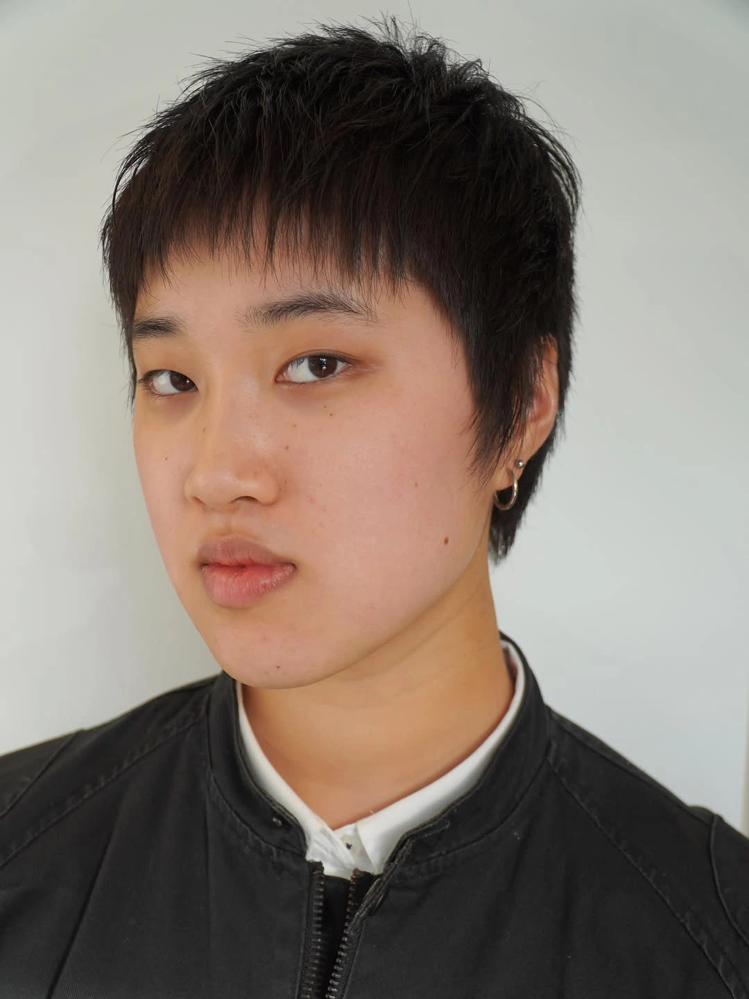 fall pixie haircut ideas 2026 Textured Soft Pixie With Feathered Layers