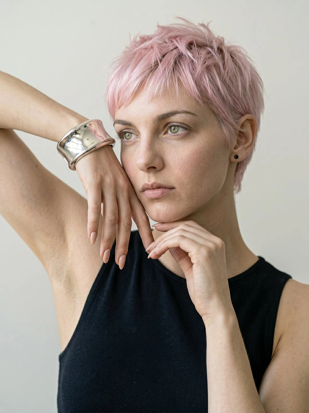 fall pixie haircut ideas 2026 Pastel Pink Pixie With Airy Feathered Texture