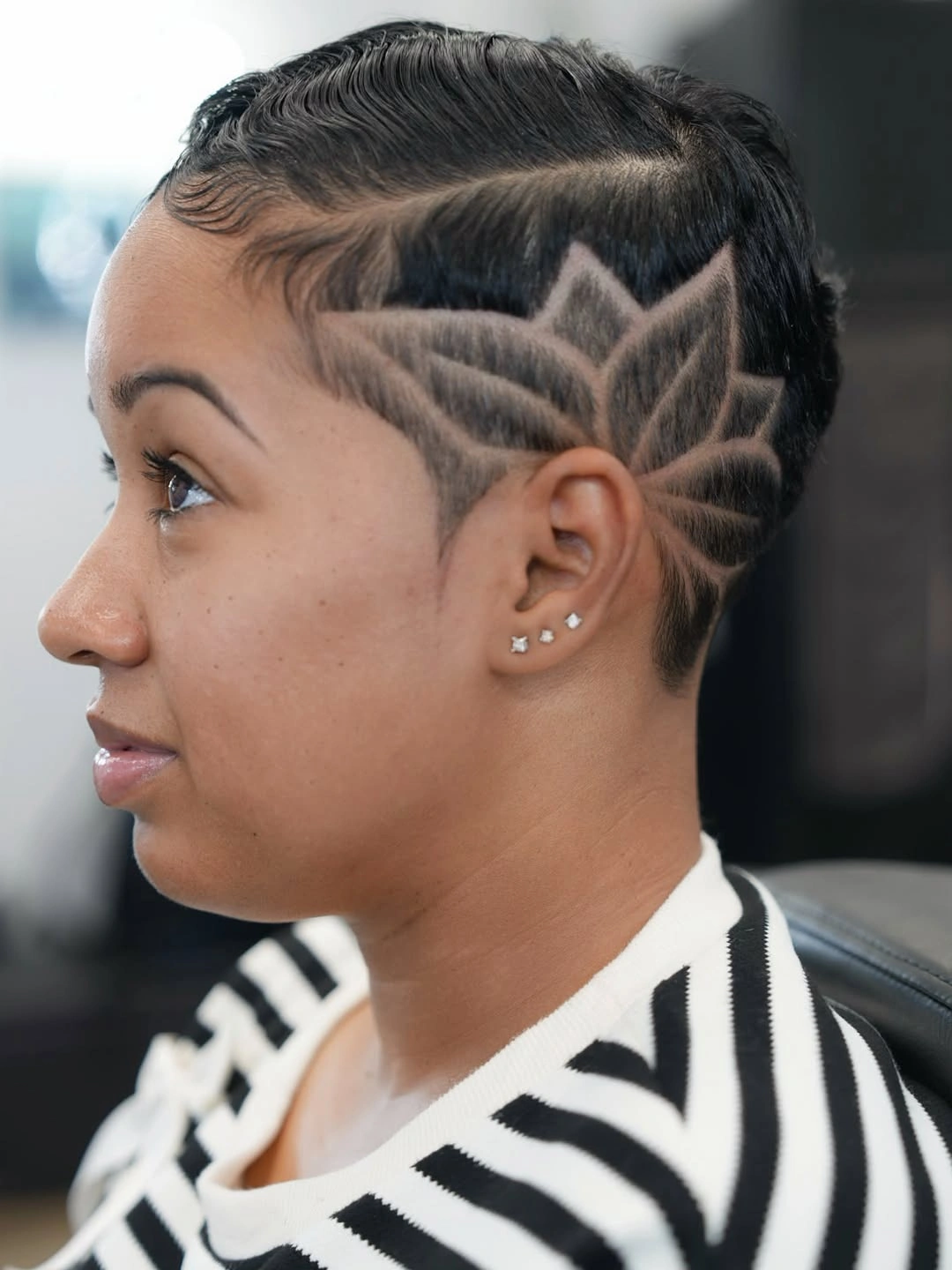 fall pixie haircut ideas 2026 Graphic Undercut Pixie With Artistic Shaved Design
