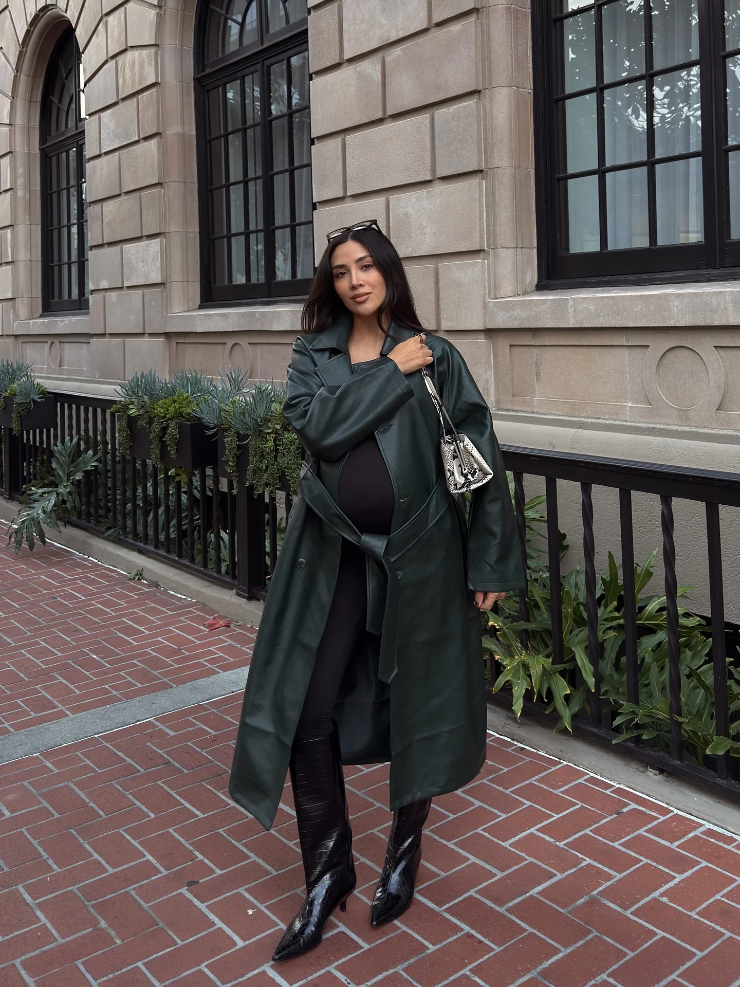 fall pregnancy outfits 2026 A Statement Leather Coat That Elevates Every Black Outfit