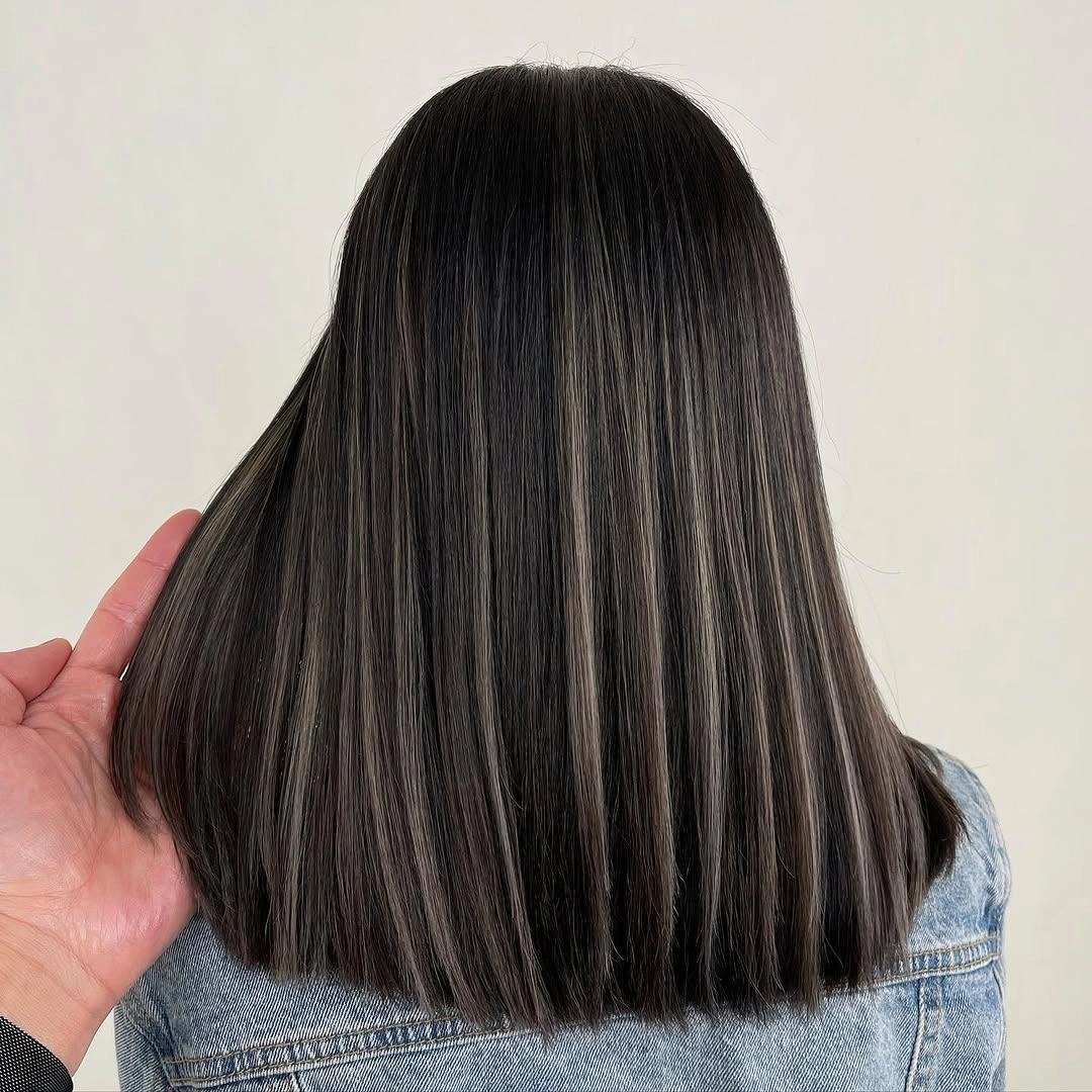 fall medium haircuts 2026 Sleek Espresso Bob With Smoky Dimension
