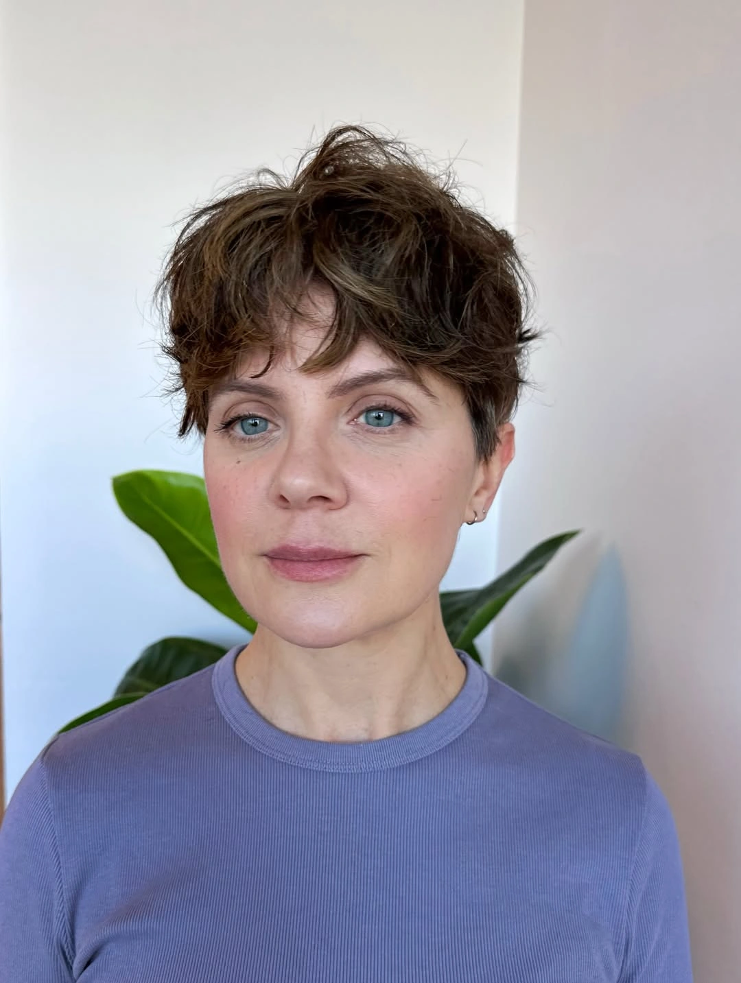 fall short haircuts 2026 Relaxed Wavy Pixie With Soft Natural Texture