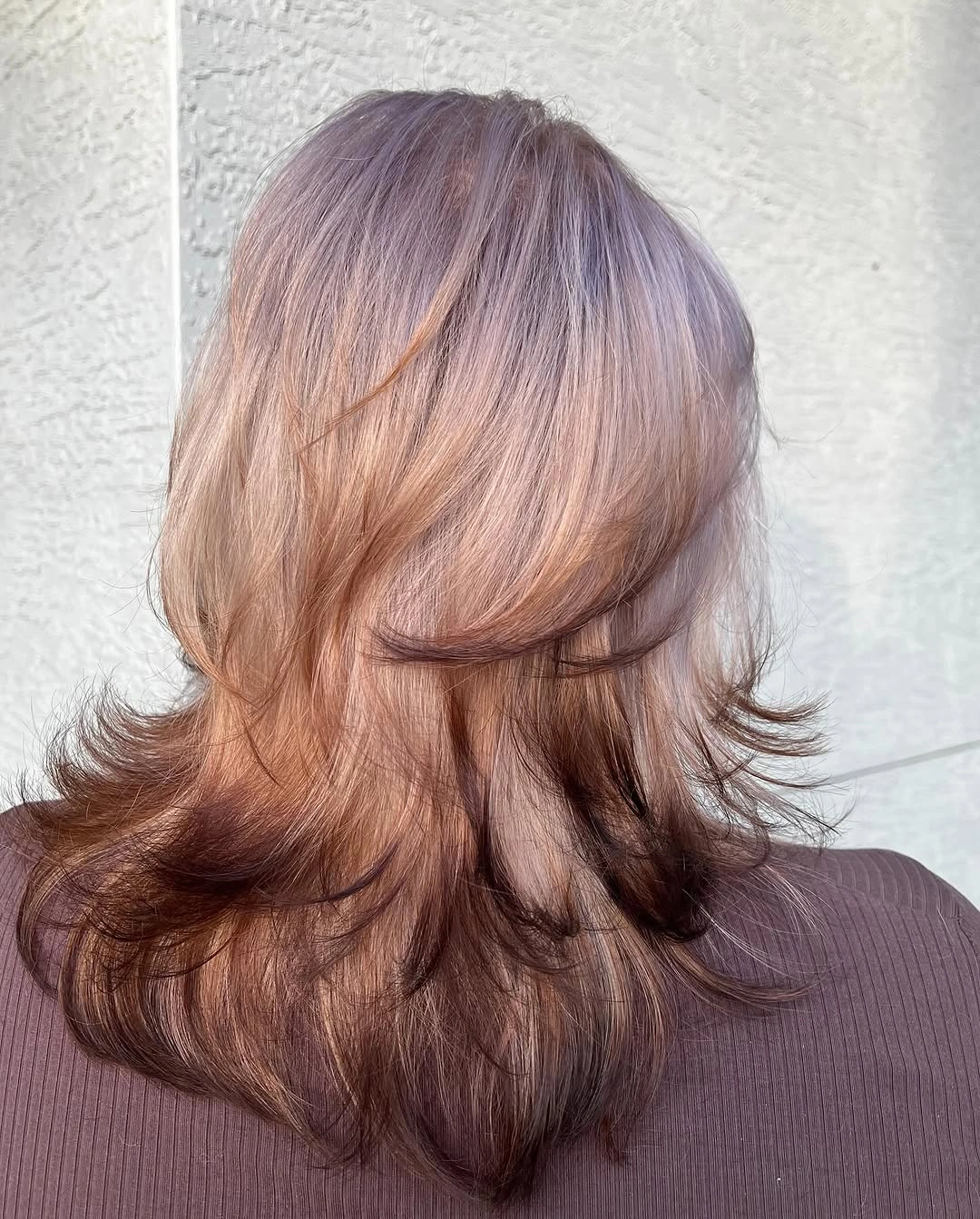 fall medium haircuts 2026 Feathered Layers With Elegant Dimension