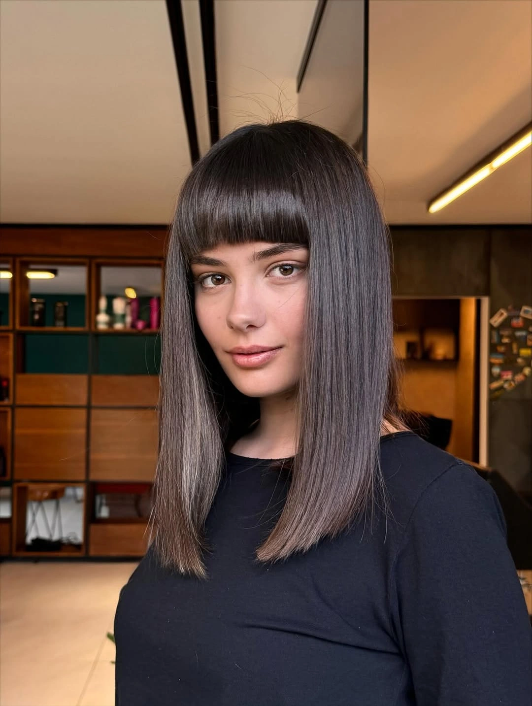 fall medium haircuts 2026 Classic Blunt Cut With Statement Bangs