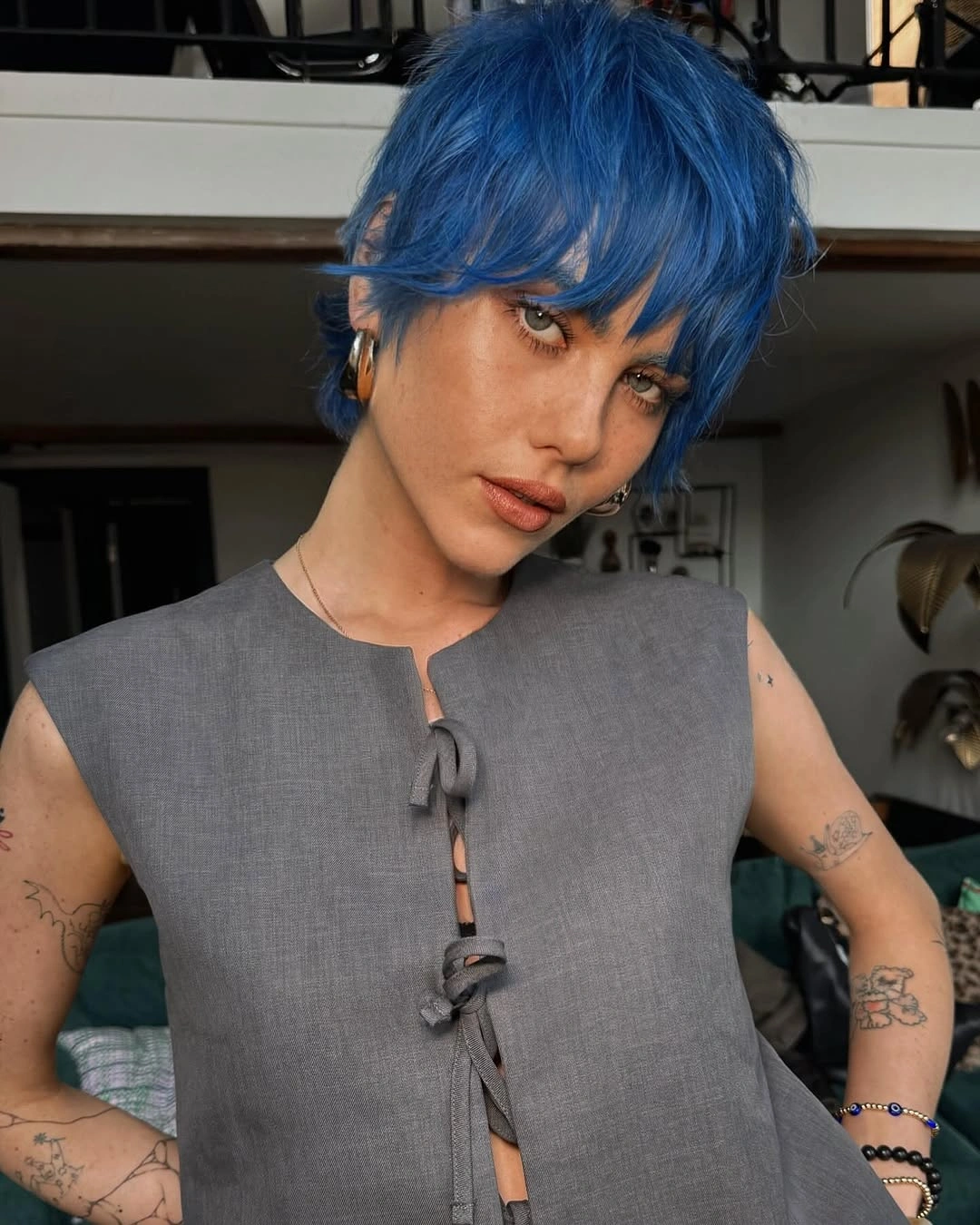 fall short haircuts 2026 Electric Blue Shag That Makes Gray Autumn Days Feel Brighter