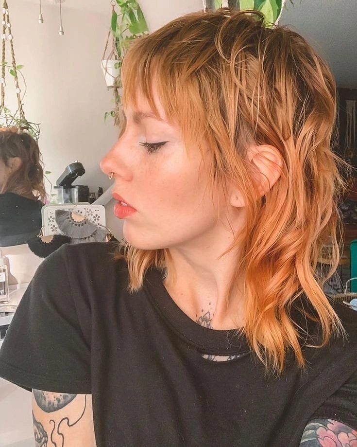 fall medium haircuts 2026 Textured Shag With Wispy Fringe