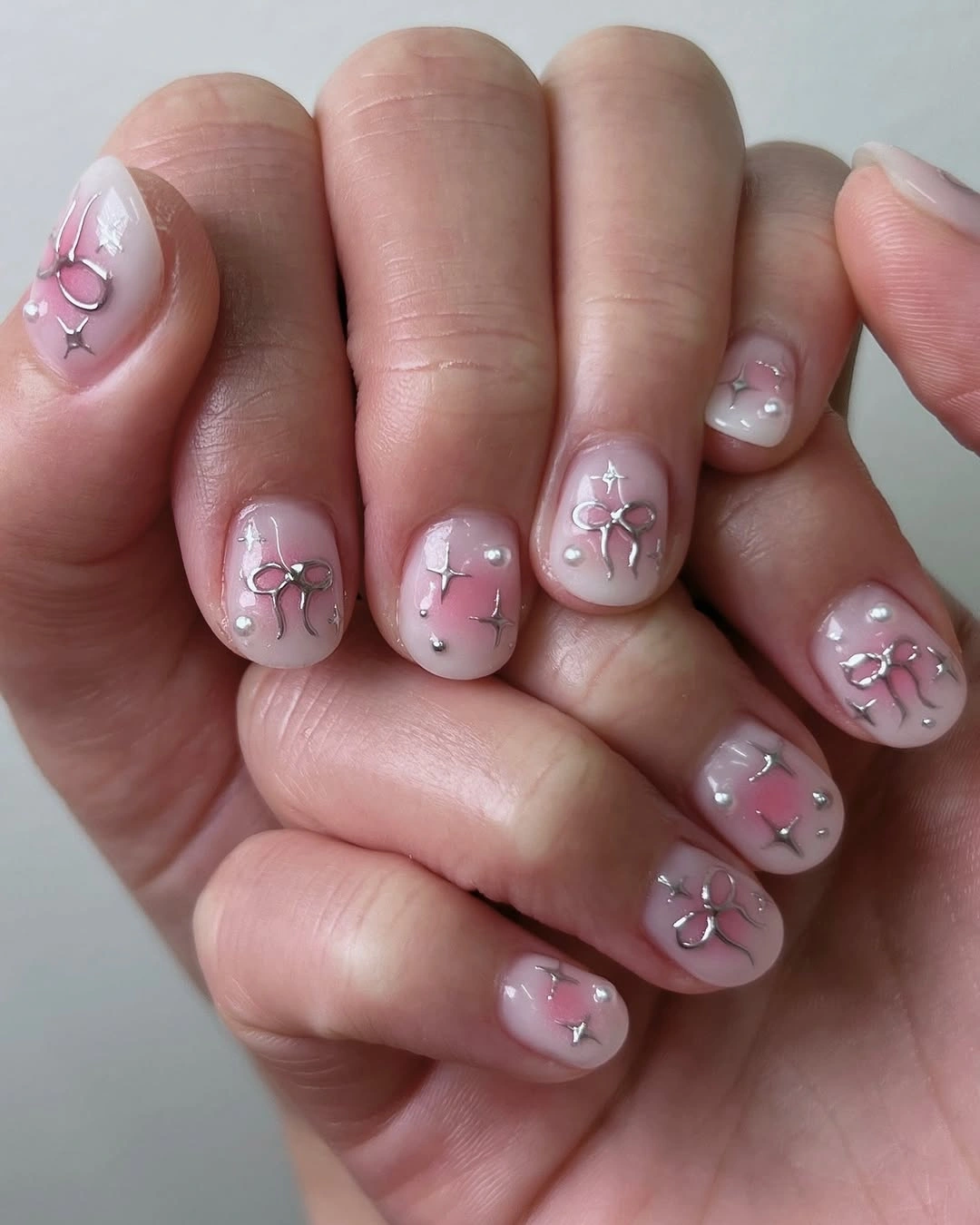 Fall short nails 2026 Blush Pink Short Nails With Bow Details