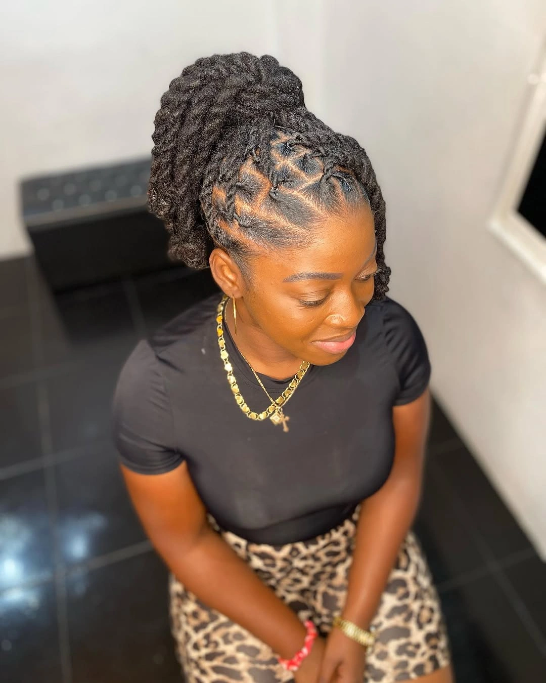 feed in braid hairstyles Textured Protective Updo with Soft Faux Locs