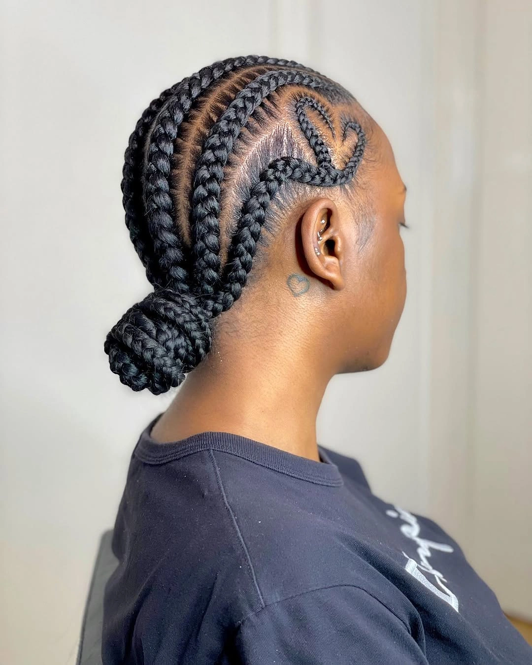 feed in braid hairstyles Heart Detail Feed-In Braids with a Low Braided Bun