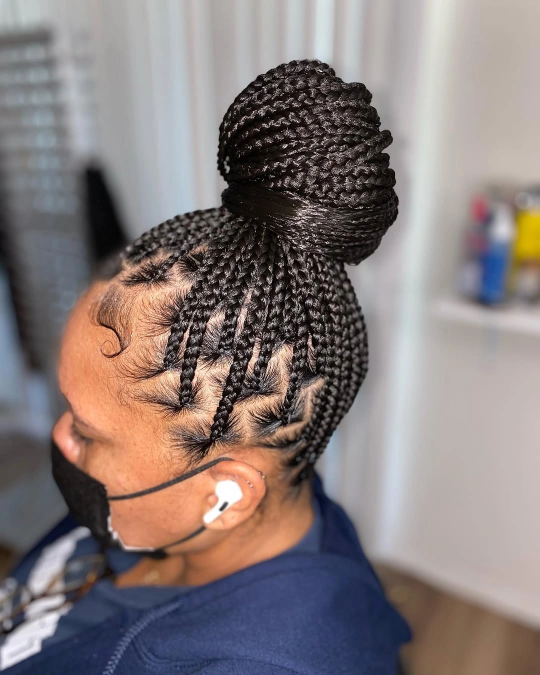 feed in braid hairstyles Statement High Braided Bun with Geometric Parts