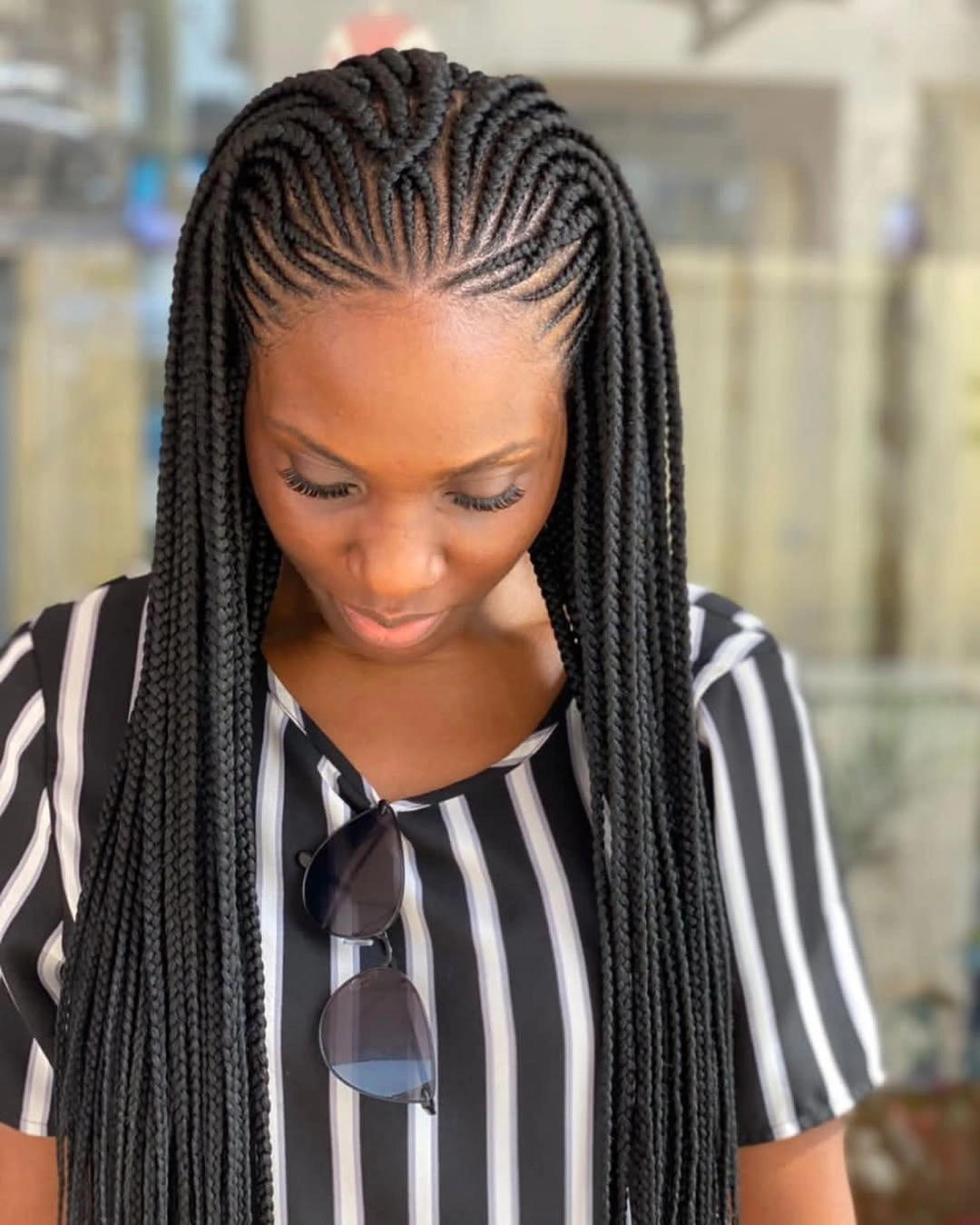 feed in braid hairstyles Elegant Center-Part Feed-In Braids with Face-Framing Length
