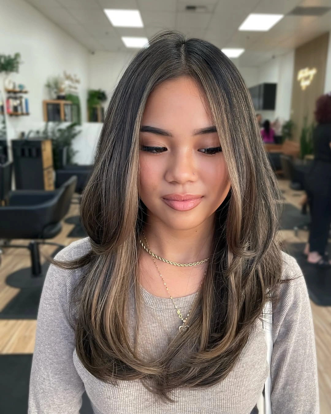 full head babylights blonde on brown hair Soft Curtain Layers with Elegant Blonde Framing