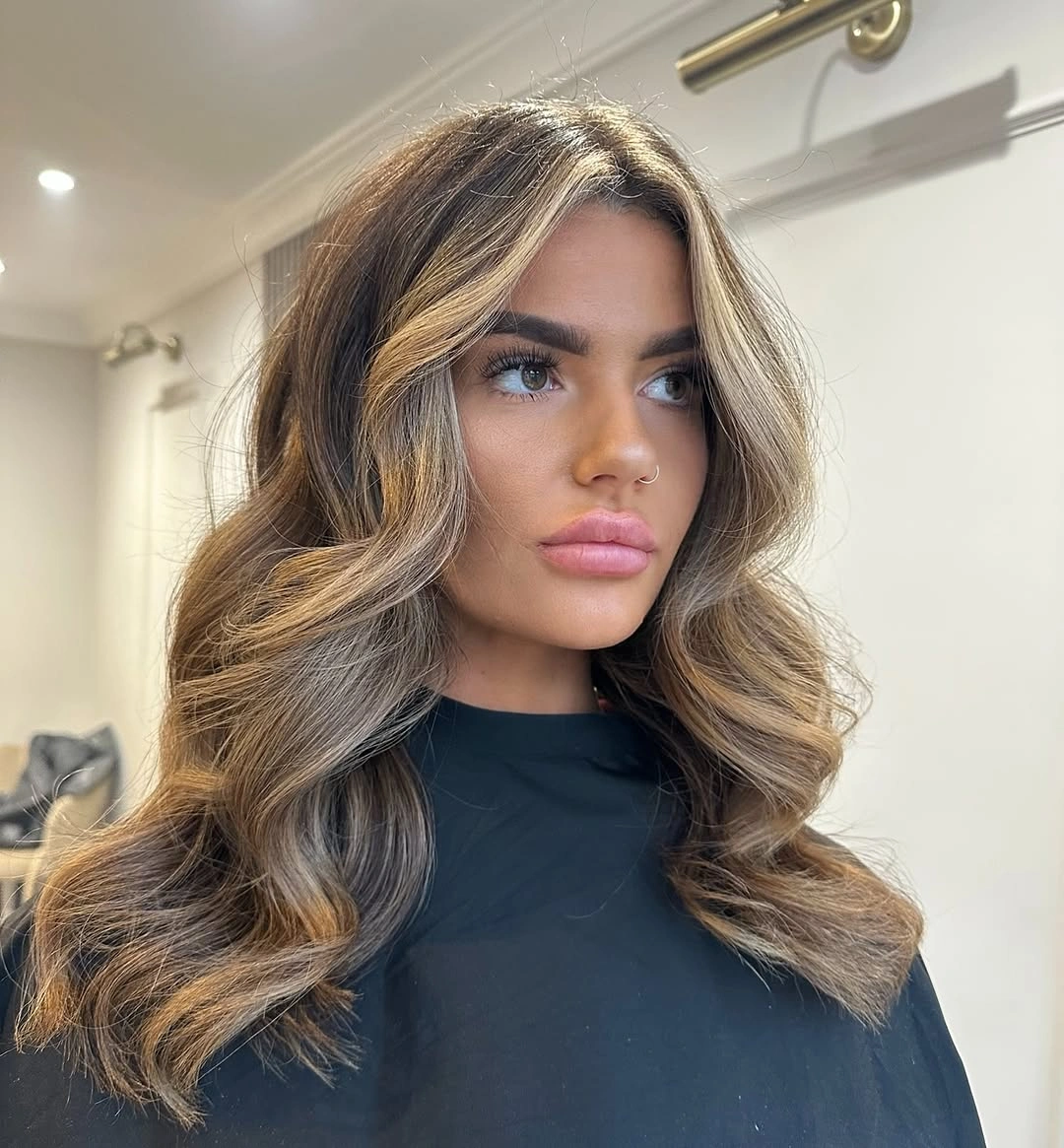 full head babylights blonde on brown hair Face-Framing Blonde That Lights Up Every Feature