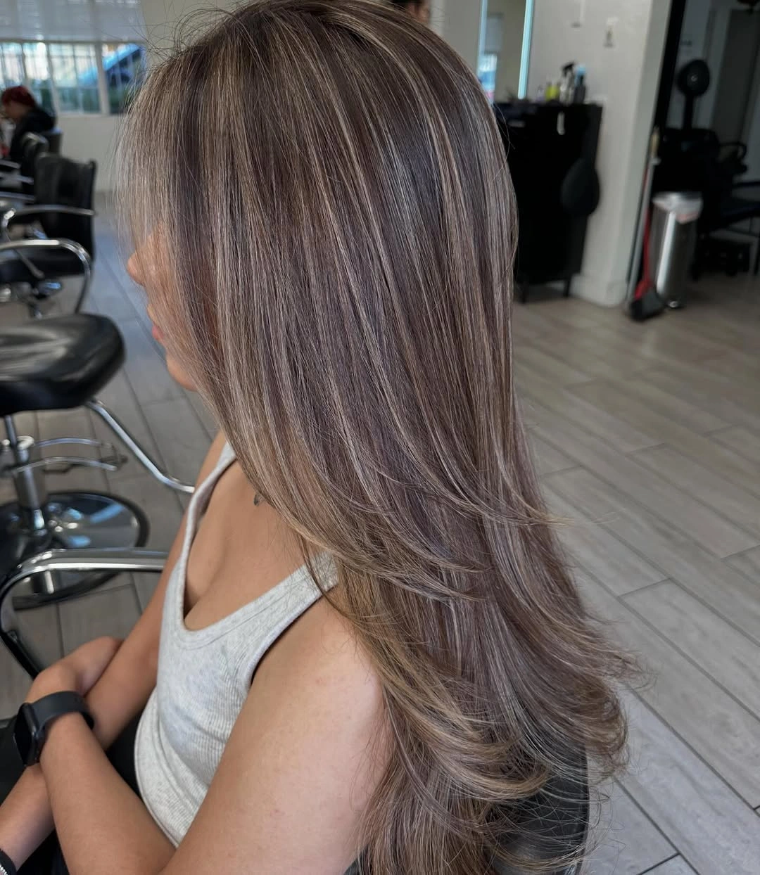 full head babylights blonde on brown hair Silky Cool Brunette with Feathered Layers