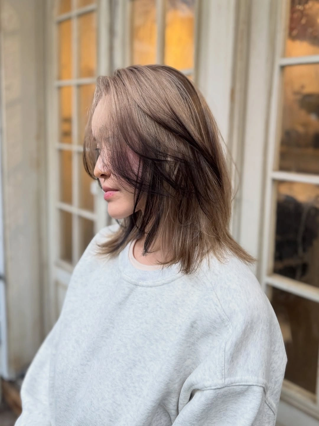 Hair Lowlights: Color Ideas and Inspiration Soft Mushroom Brunette With Face-Framing Dimension