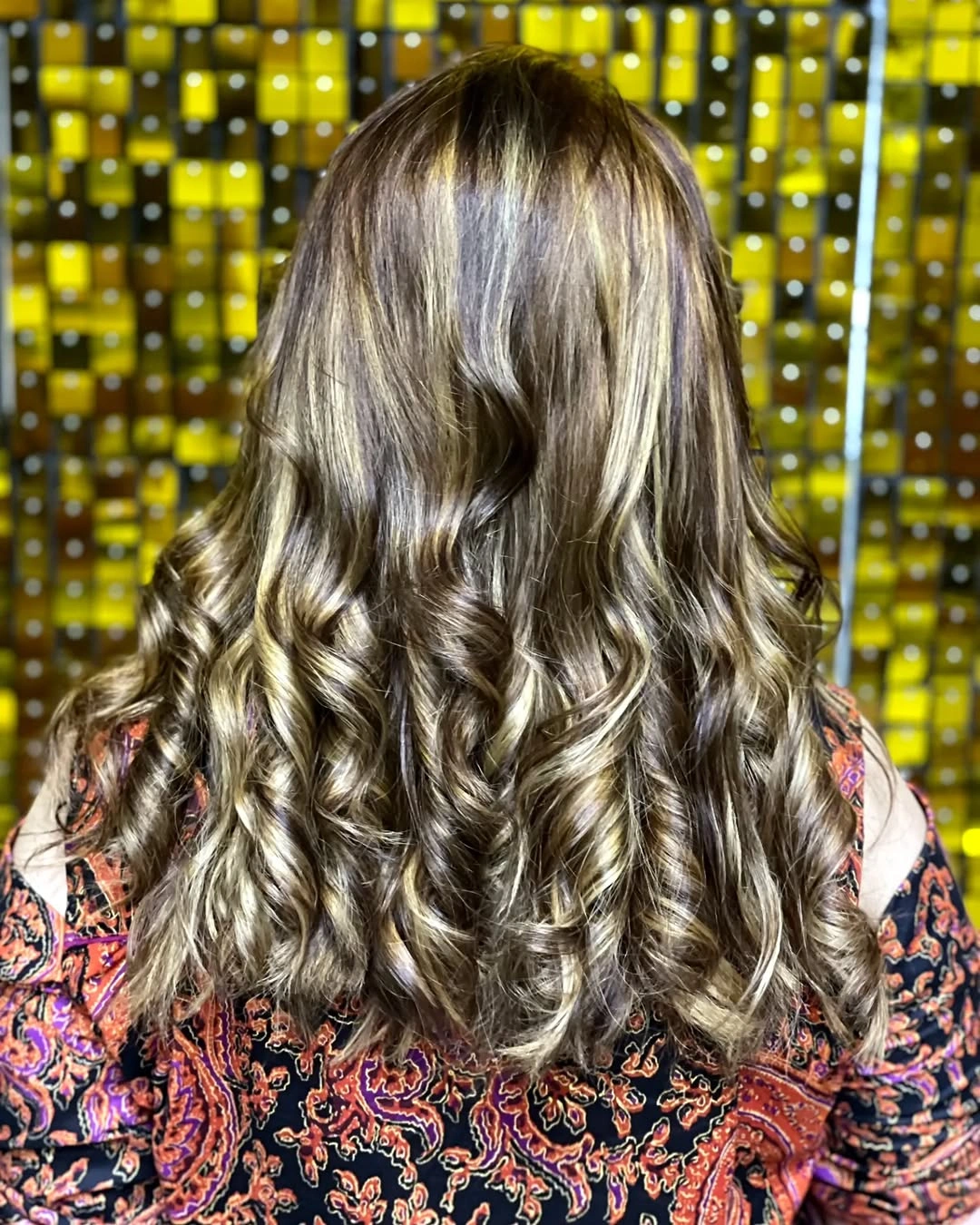 Hair Lowlights: Color Ideas and Inspiration Soft Brunette Curls With Luminous Blonde Contrast