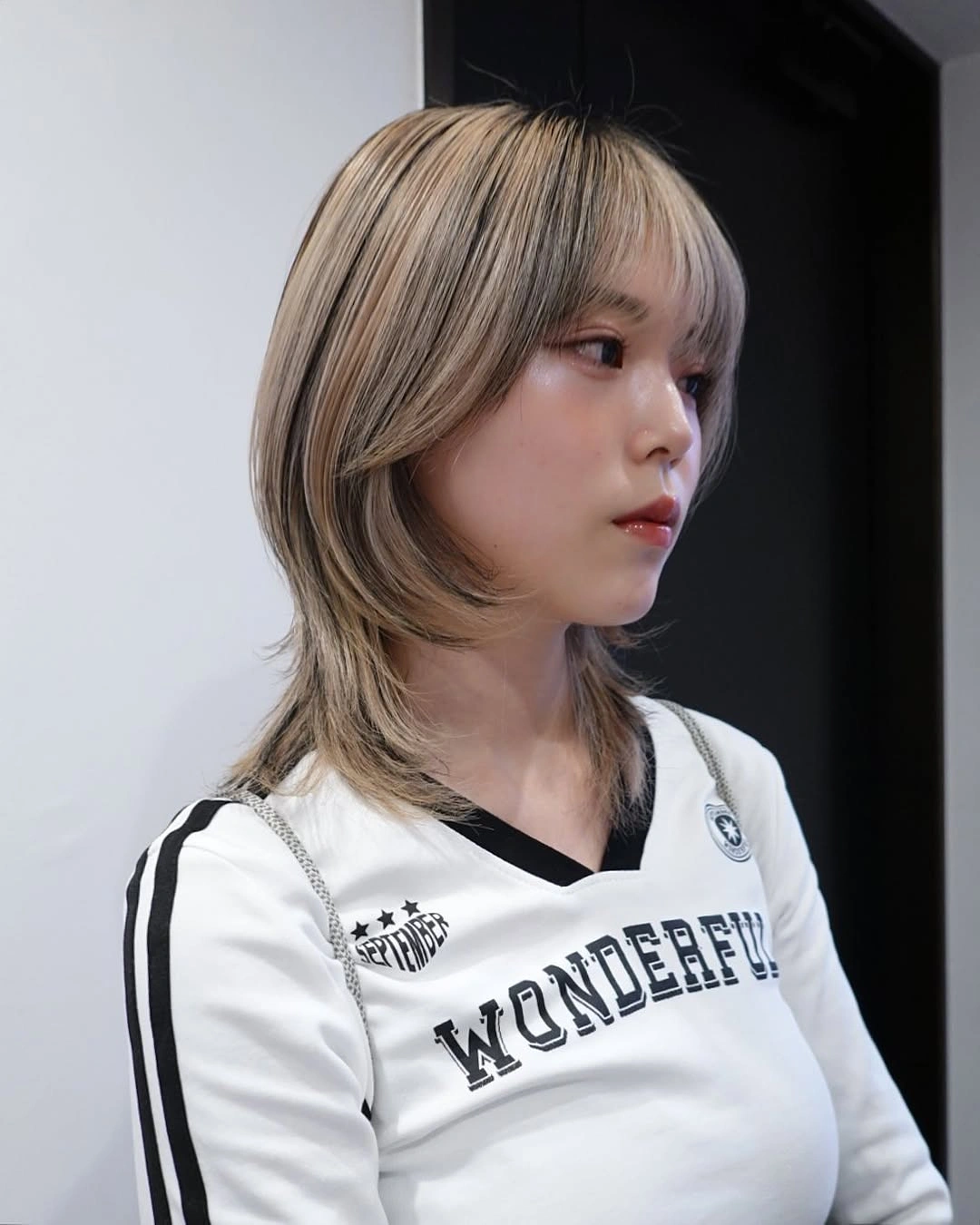 Hair Lowlights: Color Ideas and Inspiration Soft Ash Layered Bob With Korean-Inspired Lowlights