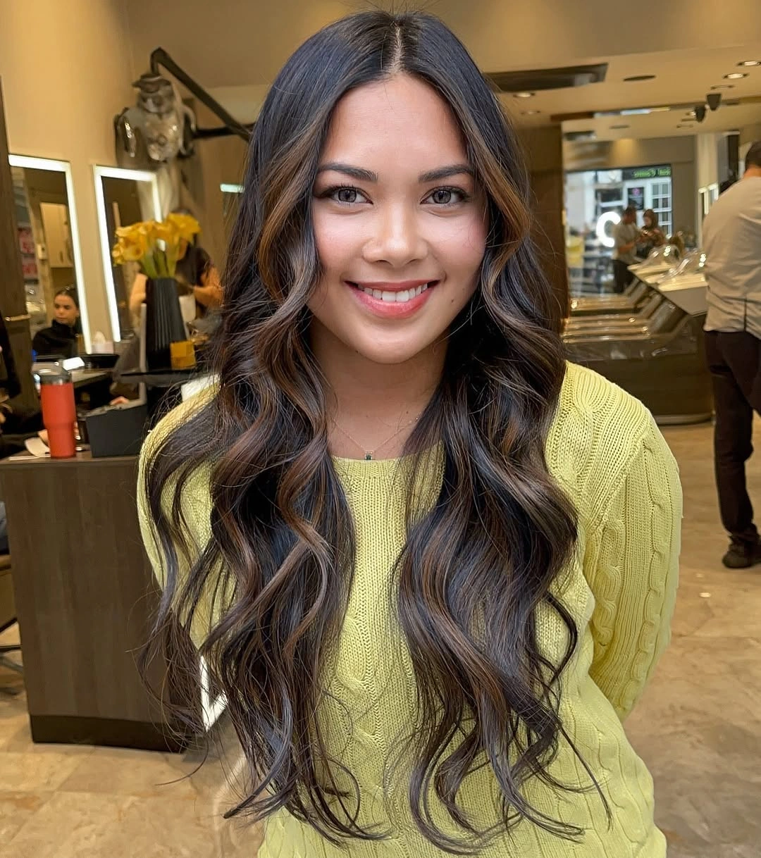 Hair Lowlights: Color Ideas and Inspiration Dimensional Brunette Waves With Soft Face-Framing Lowlights