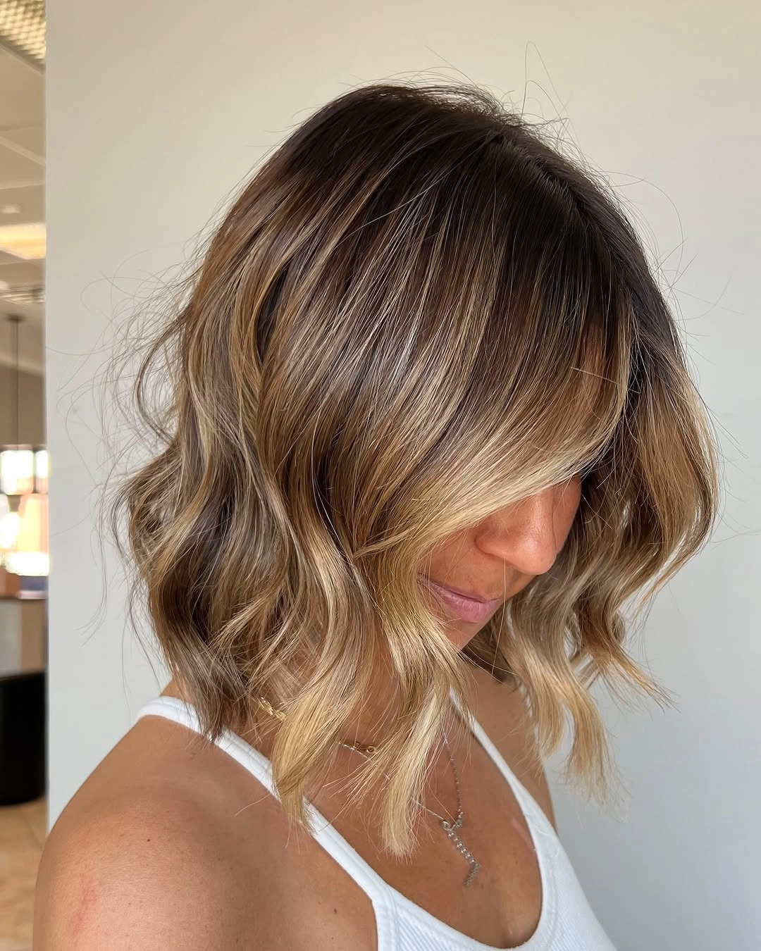 Hair Lowlights: Color Ideas and Inspiration Dimensional Blonde Bob With Shadowed Depth