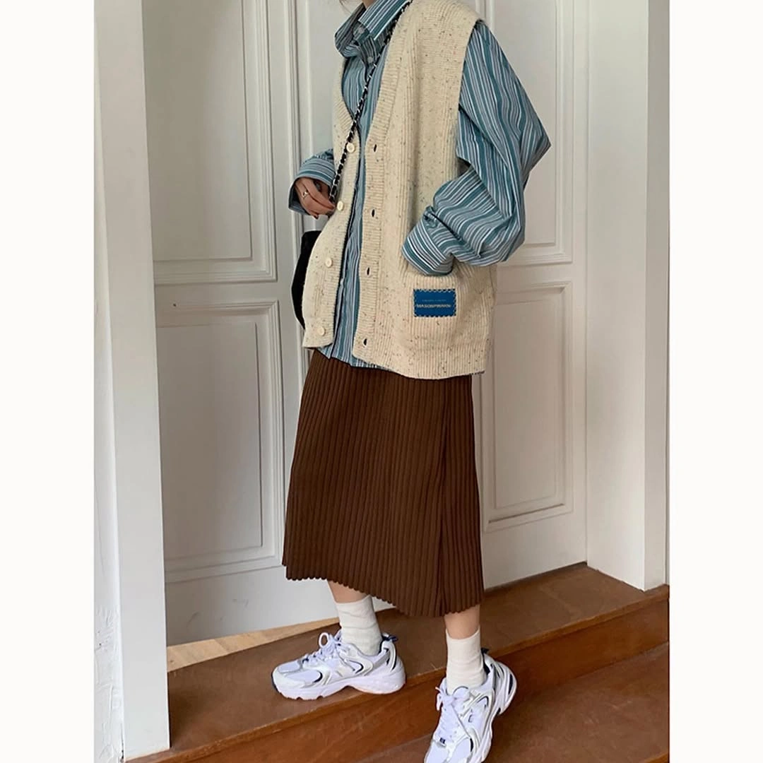 knit skirt outfits fall 2026 Preppy Layers With a Pleated Knit Skirt