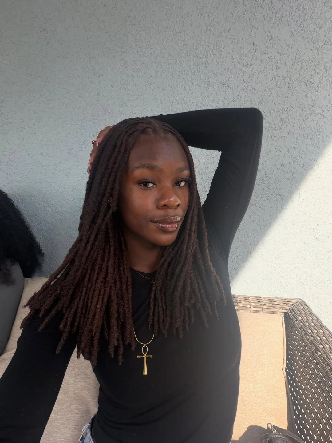 locs hairstyles for black women Elegant Mid-Length Chocolate Brown Locs with a Timeless Center Part