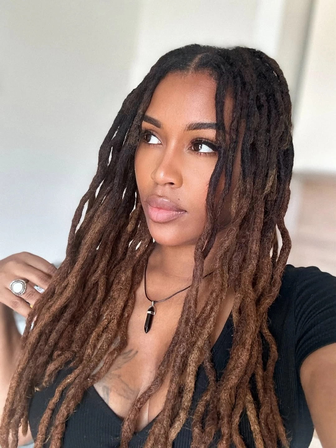 locs hairstyles for black women Long Layered Brown Locs with Soft Face-Framing Dimension