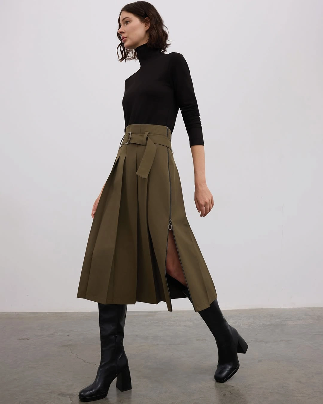 midi skirt fall outfit 2026 Olive Tailoring with Sleek Boots for Modern Sophistication
