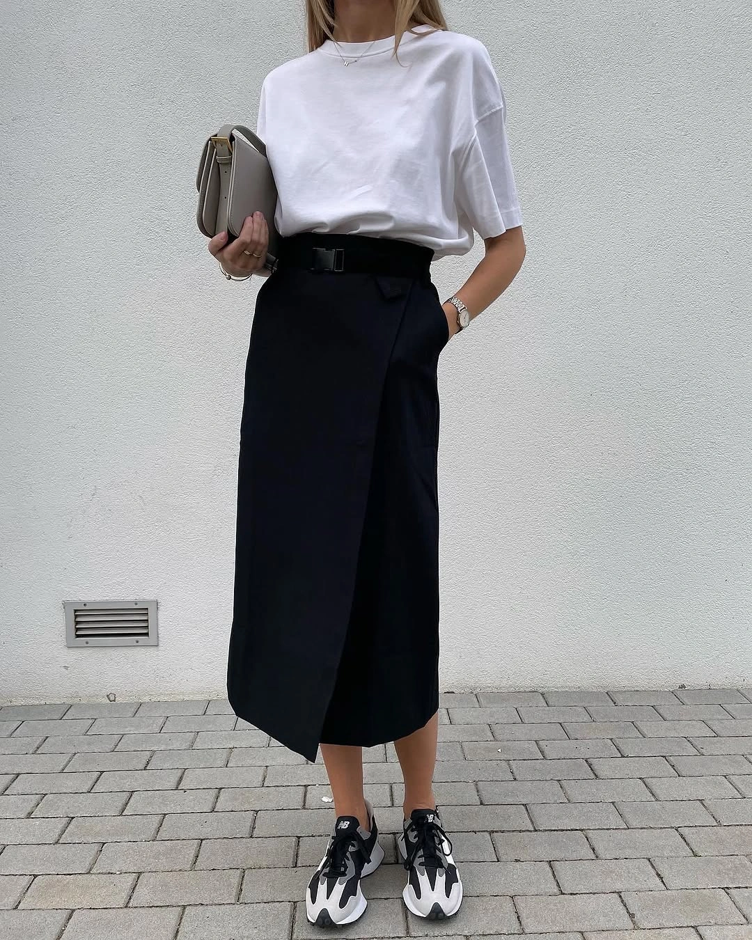 midi skirt fall outfit 2026 Sporty Sneakers Give a Tailored Midi Skirt a Modern Twist