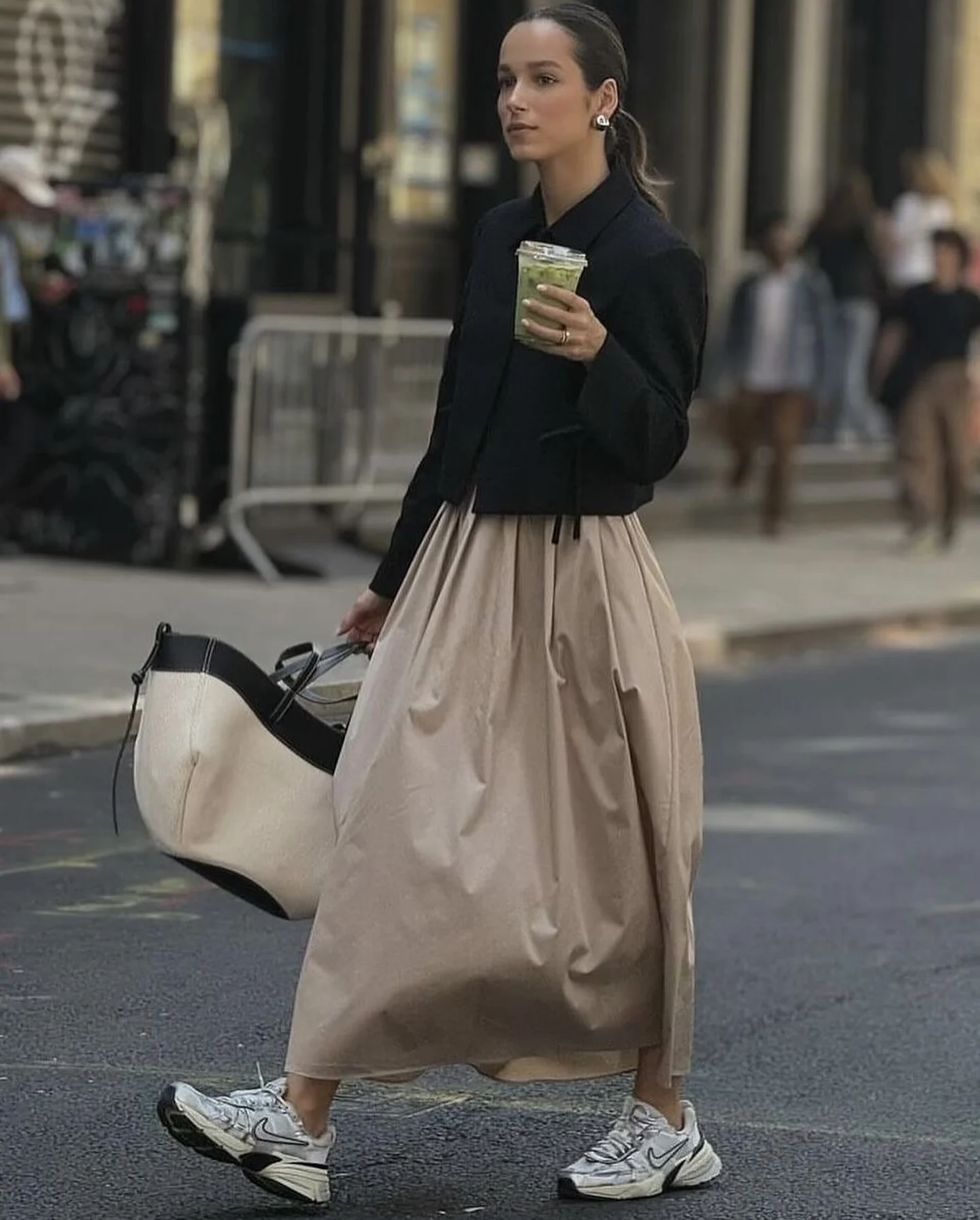 midi skirt fall outfit 2026 Sporty Sneakers Meet a Dramatic Full Midi Skirt
