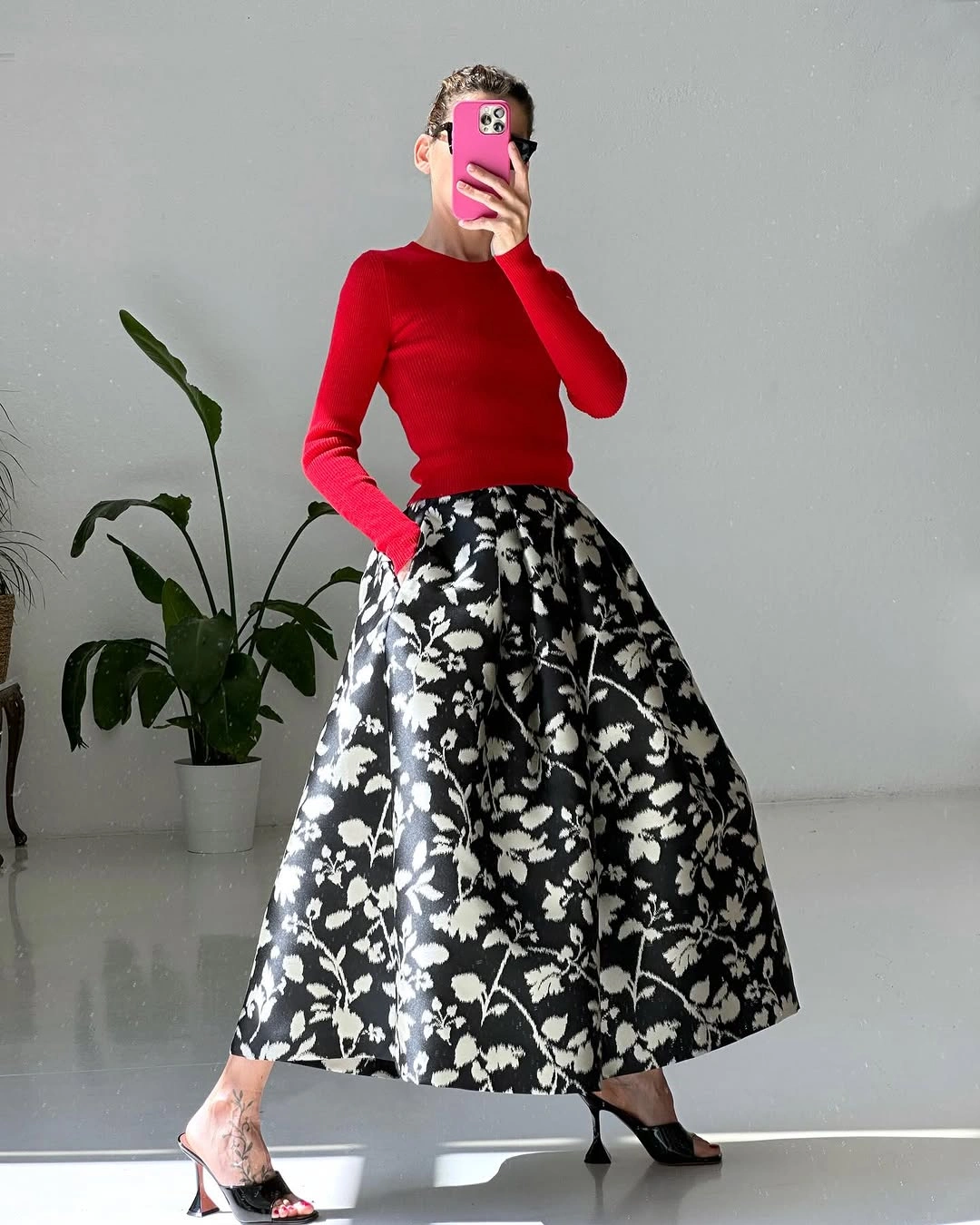 midi skirt fall outfit 2026 Classic Monochrome Florals with a Bold Pop of Red