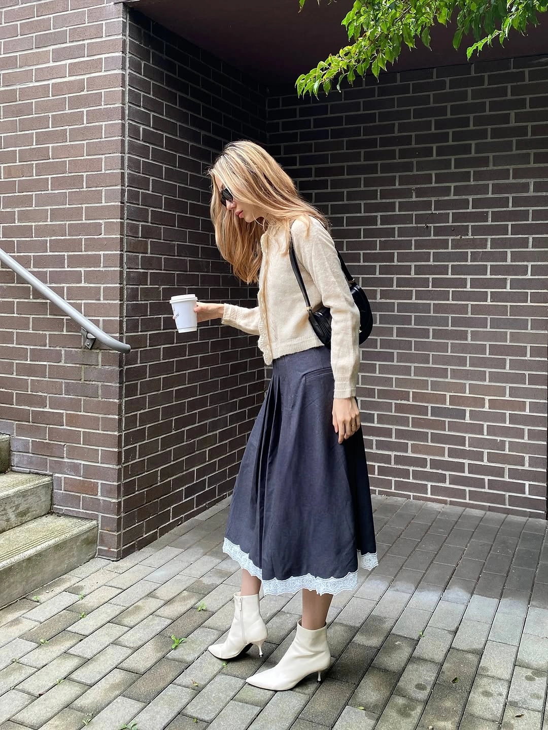modest fall outfits 2026 Soft Knit Layers with a Feminine Midi Skirt