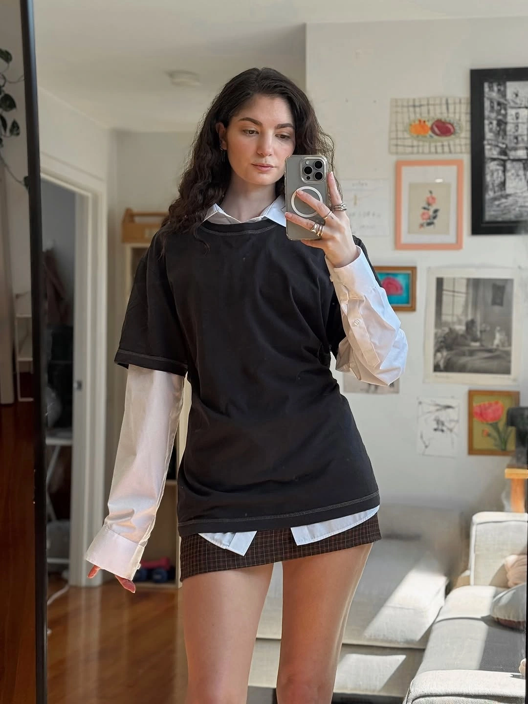 September fashion trends 2026 Layered Black Polo Over A White Shirt