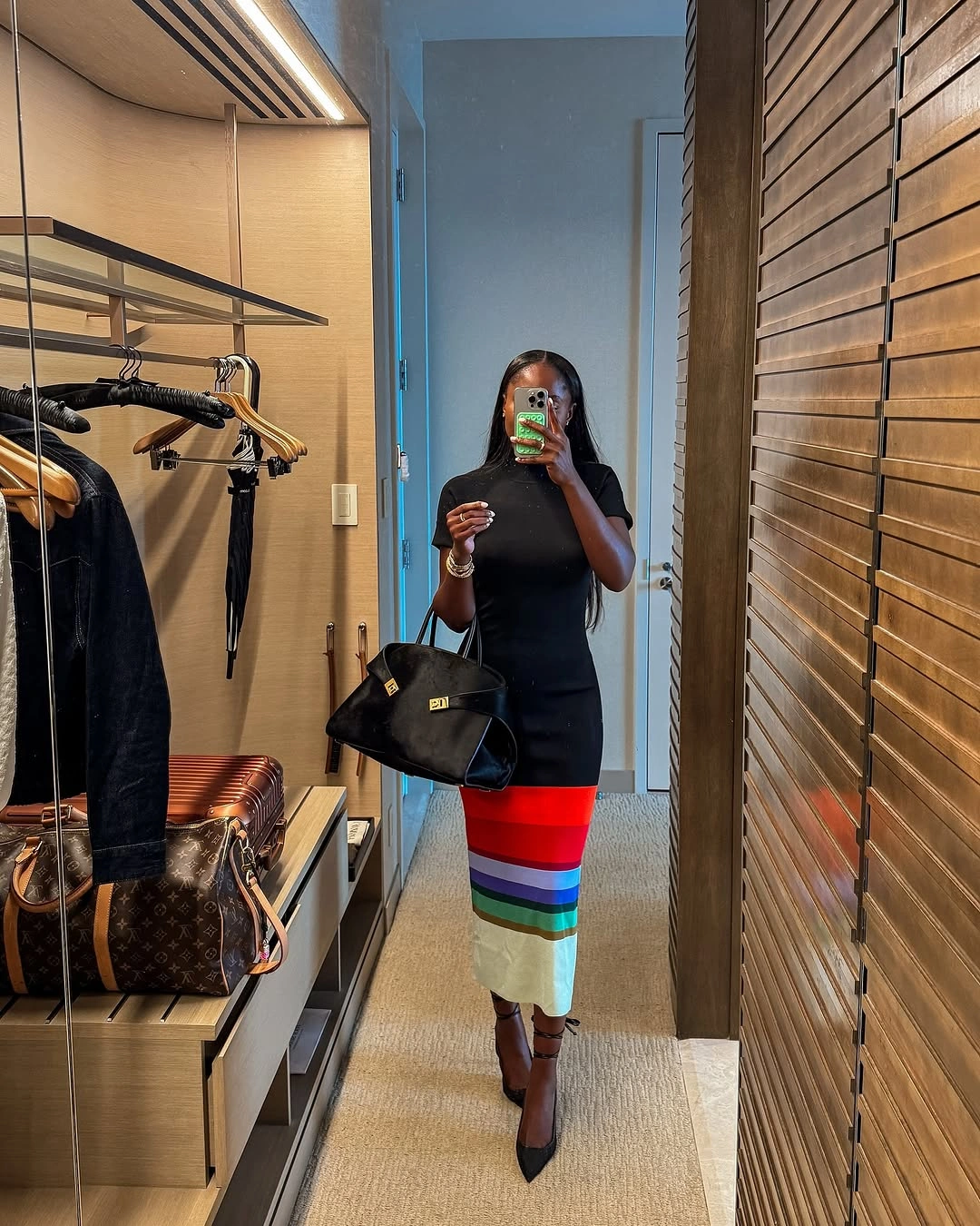 September fashion trends 2026 Black Top With A Rainbow Stripe Skirt