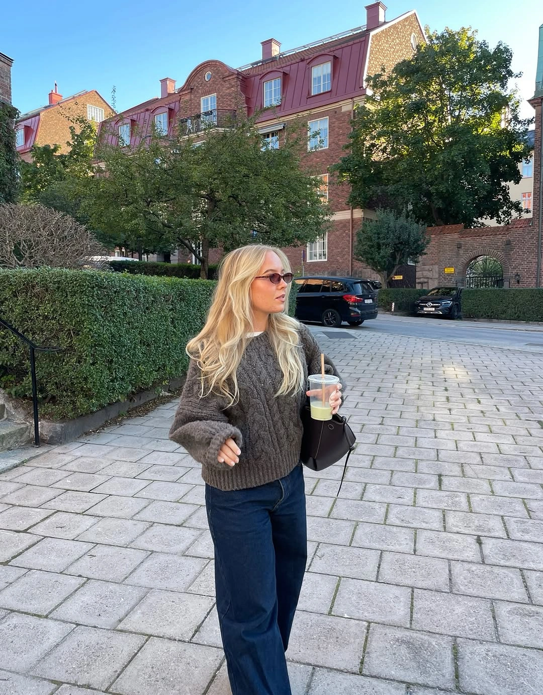 September fashion trends 2026 Chunky Gray Knit With Dark Wide Jeans