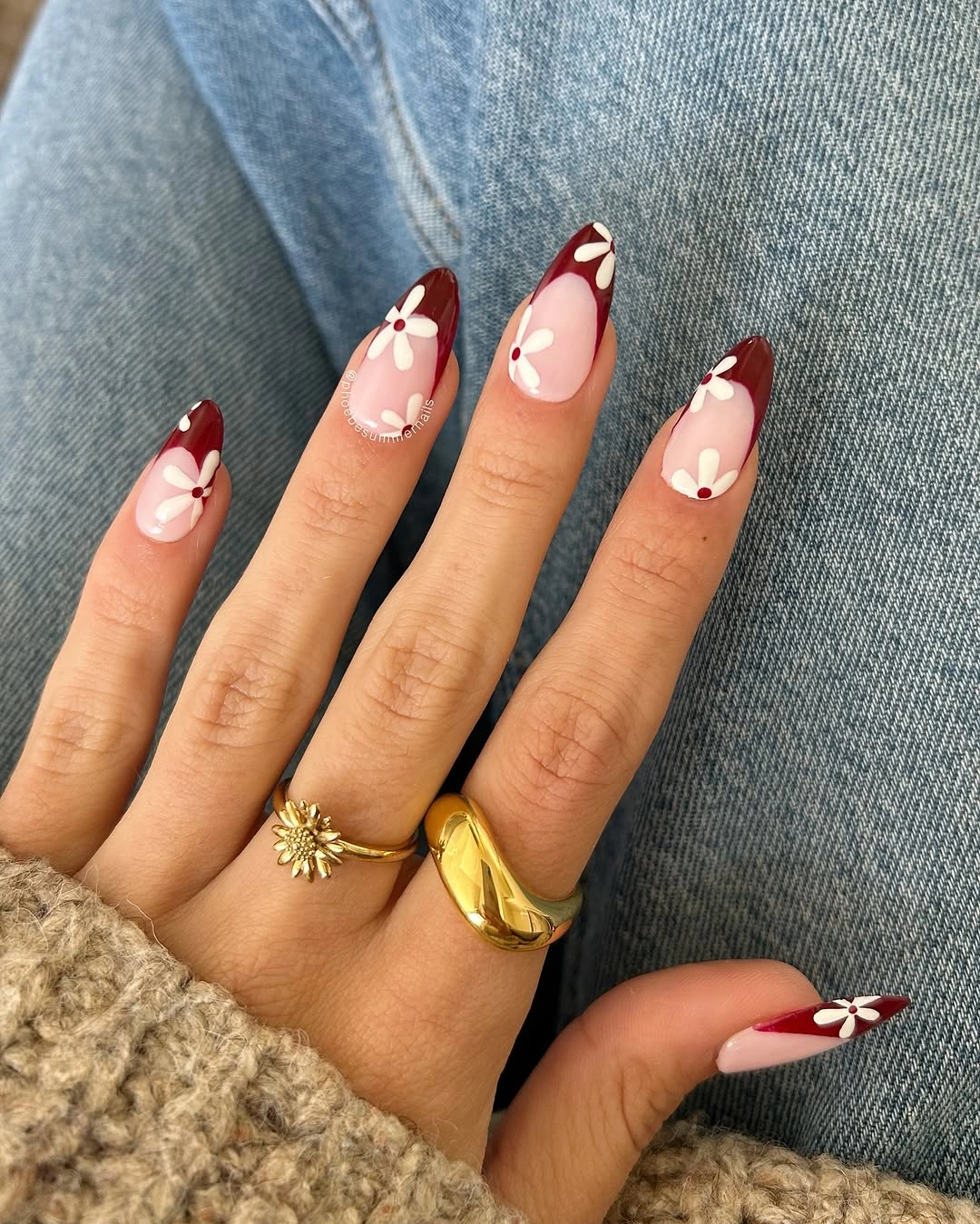 September nail art ideas 2026 Burgundy French Tips With White Flower Art
