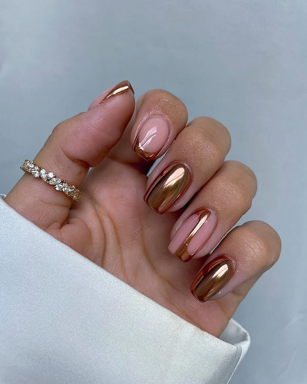 September nail art ideas 2026 Brown Chrome Swirls on Sheer Pink Nails