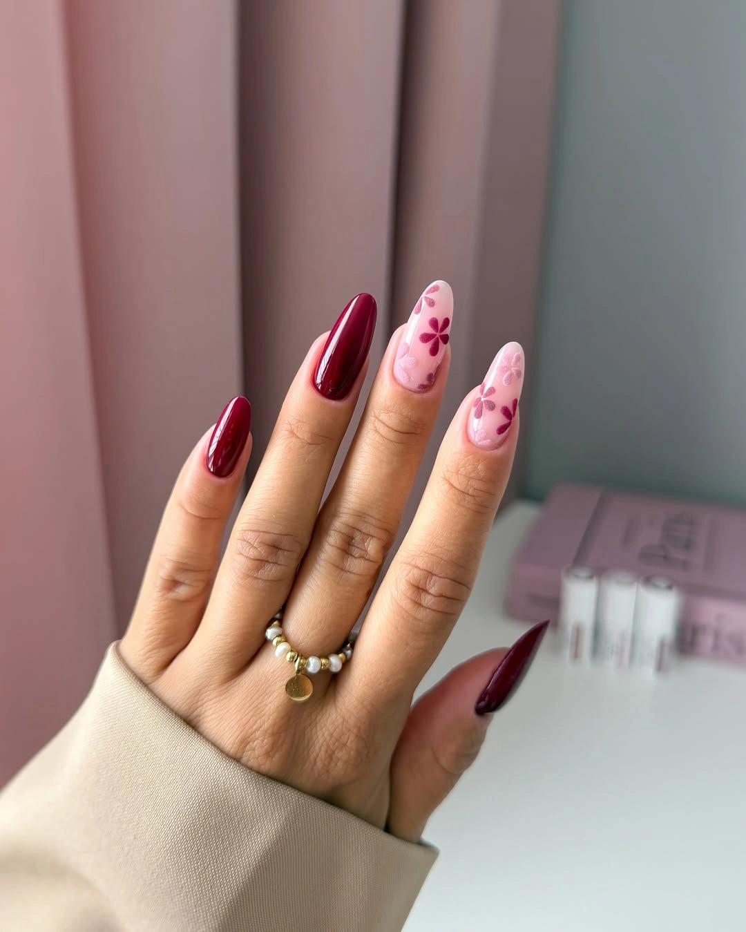 September nail art ideas 2026 Burgundy Nails With Pink Floral Accents