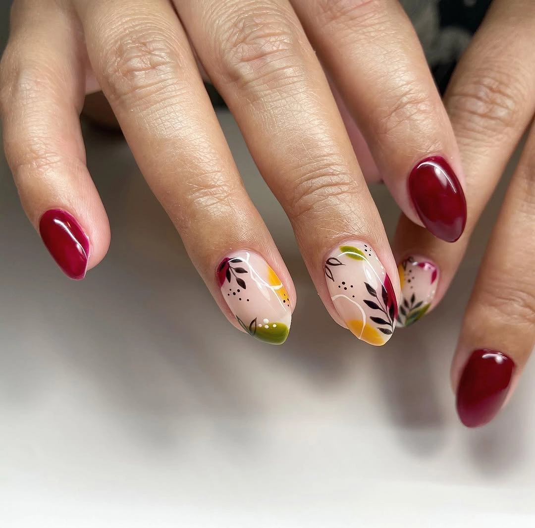 September nail art ideas 2026 Red Nails With Tiny Floral Accent Clusters