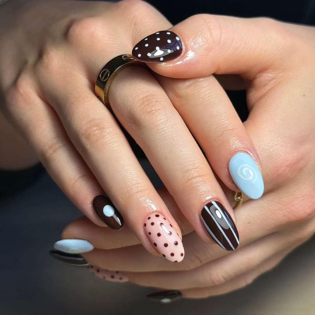 September nail designs 2026 Mixed Black Dots and Powder Blue Accent