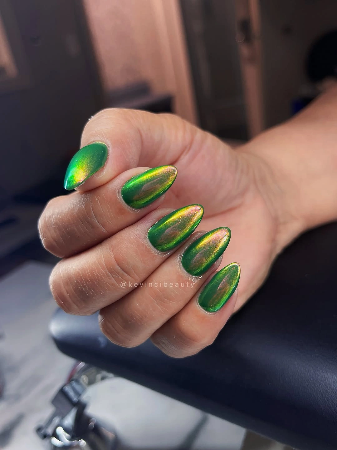 September nail designs 2026 Green Cat Eye Almond Nails With Golden Glow