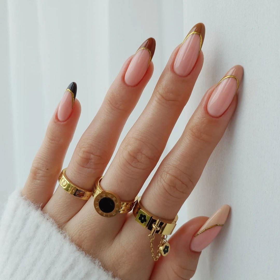September nail designs 2026 Warm Brown French Tips on Sheer Almonds