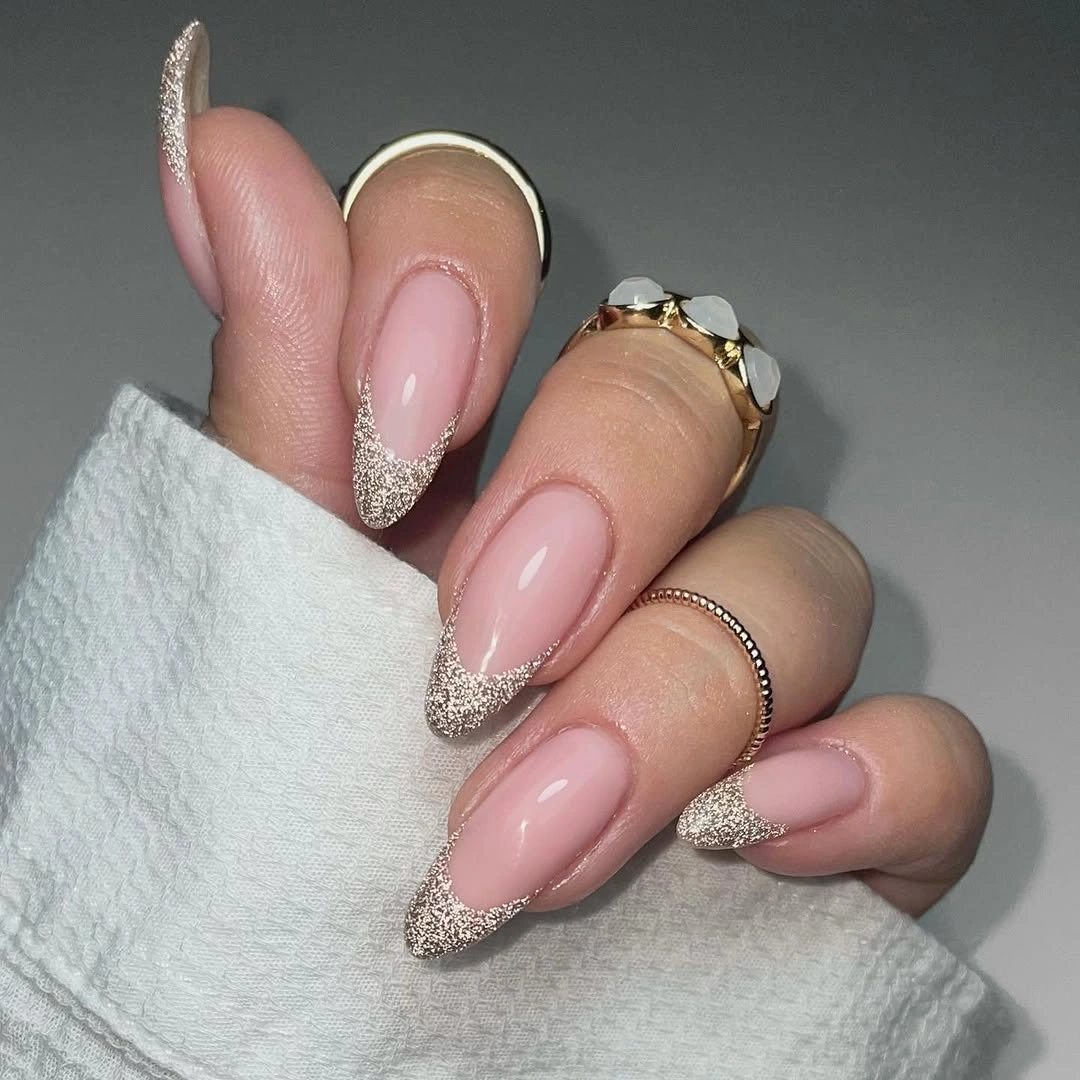 September nail designs 2026 Glitter French Edges on Sheer Pink Almonds